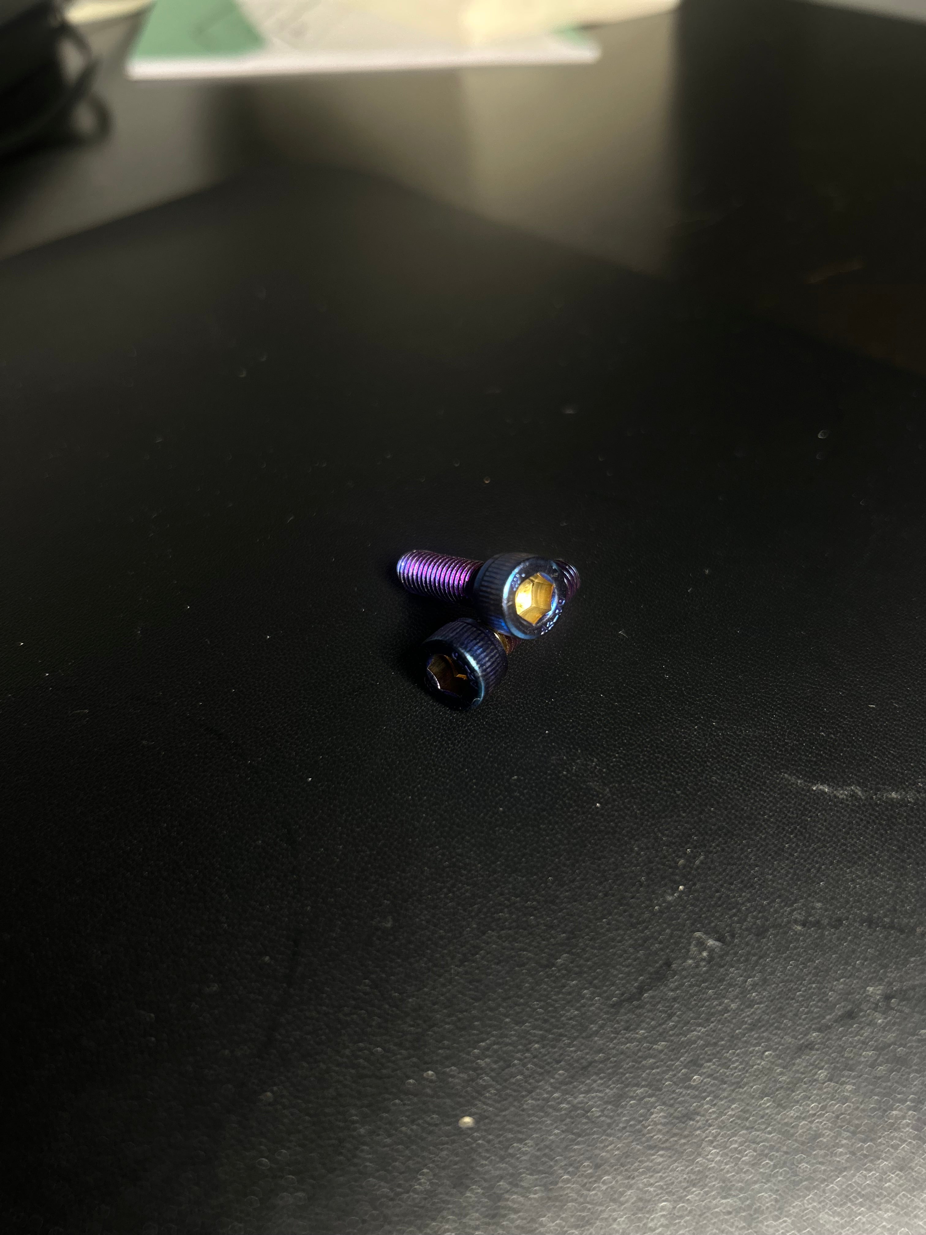 Titanium brake caliper bolts